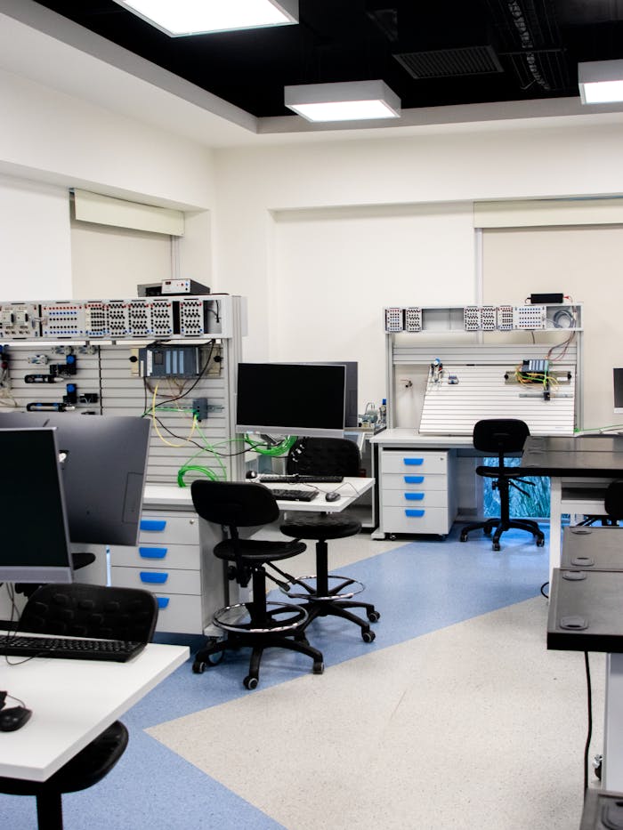 A laboratory with several computers and desks